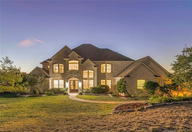 Stunning 5 bed, 4.5 bath home with over 4000 sq ft on 1.4 acres of beautiful Hill Country!