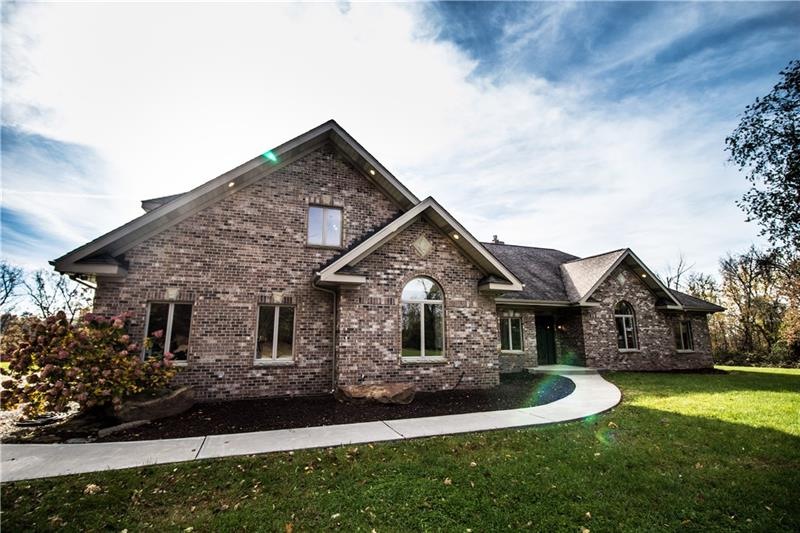Single level living custom brick house on over 12 