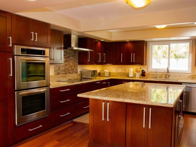 Two large convection ovens and large center island.