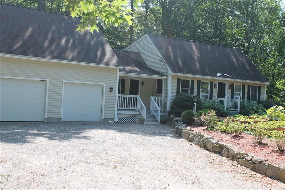 Front of House with stone wall.