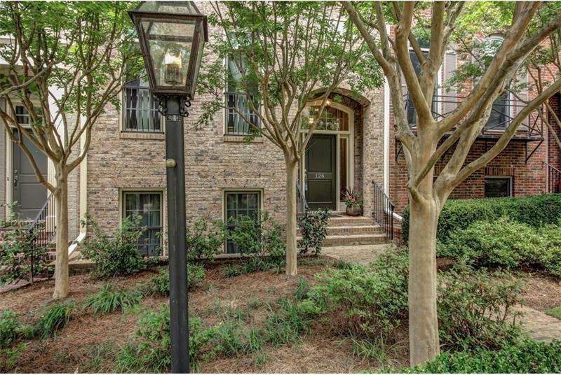 Wonderful entrance to this brick townhome with gas
