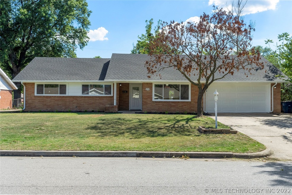 Welcome home to 6828 E 57th Pl.