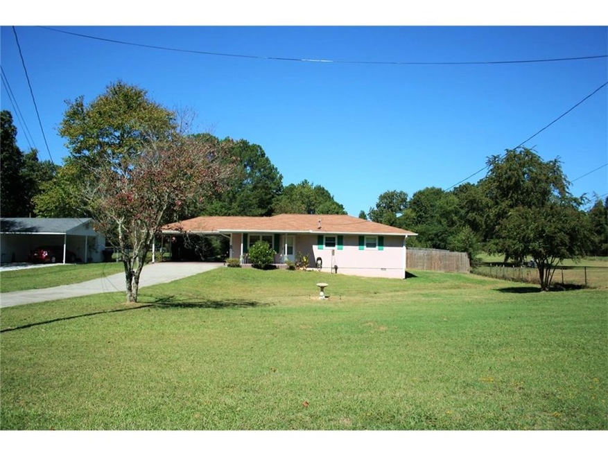 CHARMING THREE BEDROOM RANCH WITH LARGE YARD