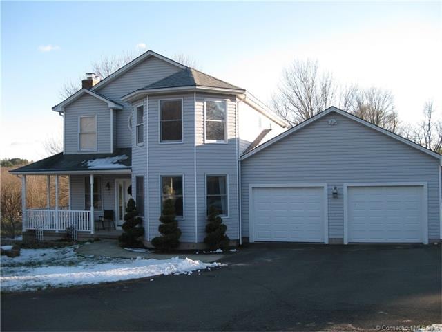 Exterior Front w/ Oversize 2 car garage with work 