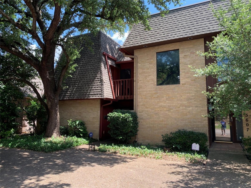 View of front of townhome with balcony