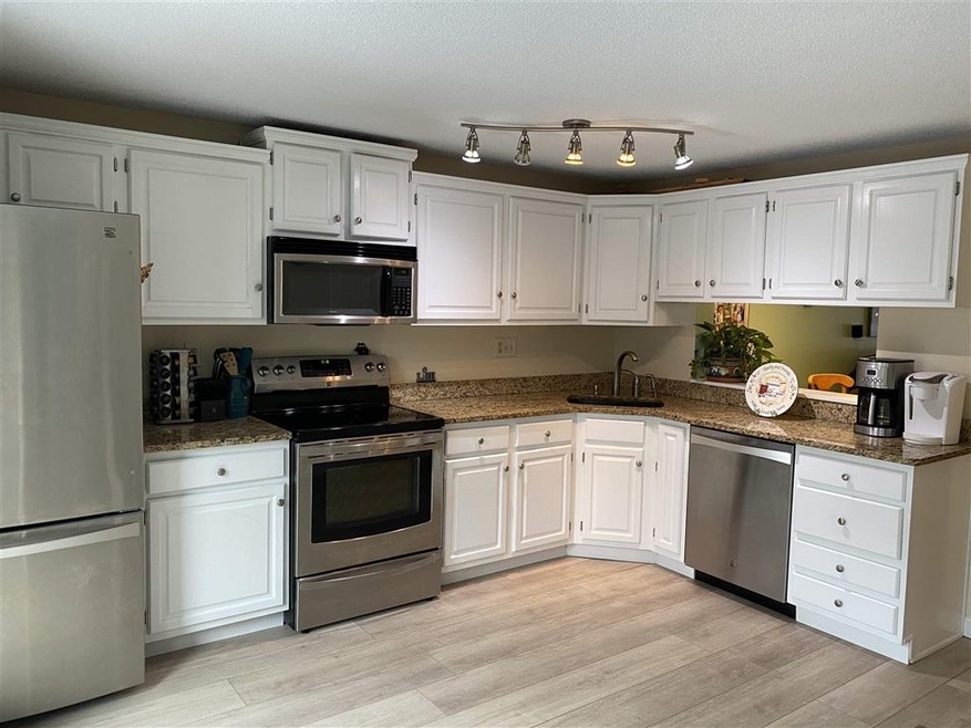 182 Bartemus Trail unit U58, Nashua, NH 03063 - photo 1