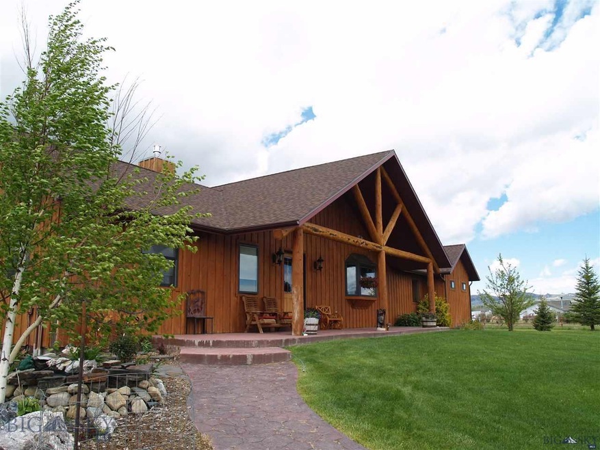 Upscale Home with Log Accents