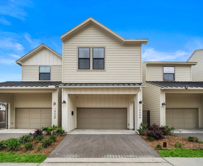 Inviting curb appeal with modern lines and a two-s