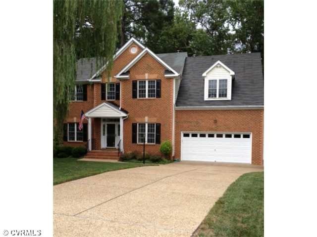 Exterior Front - Maintenance free exterior! Brick 