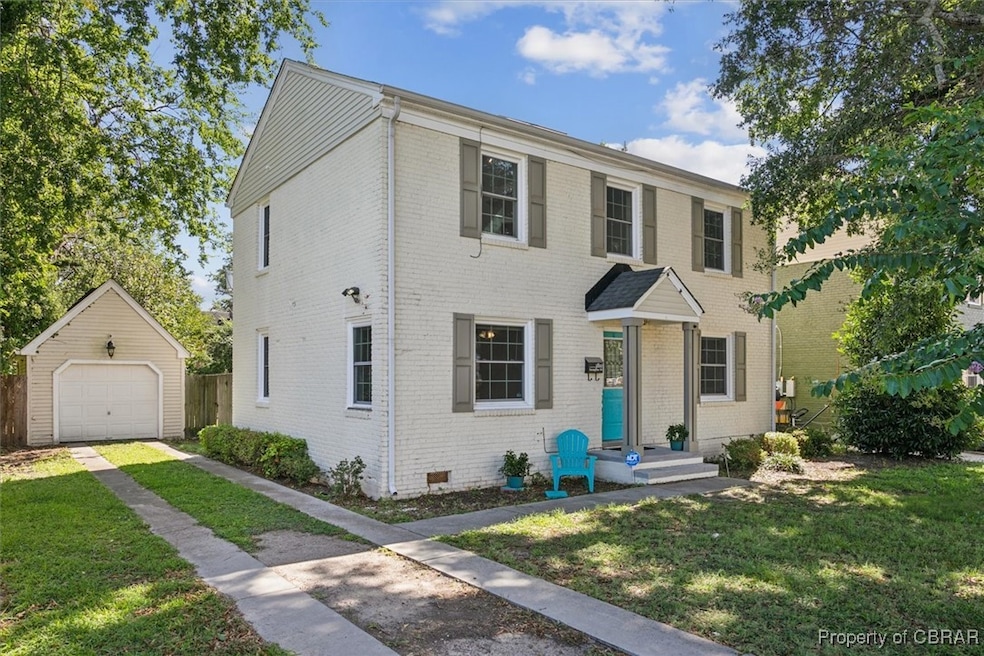 View of front of home featuring a garage, a front