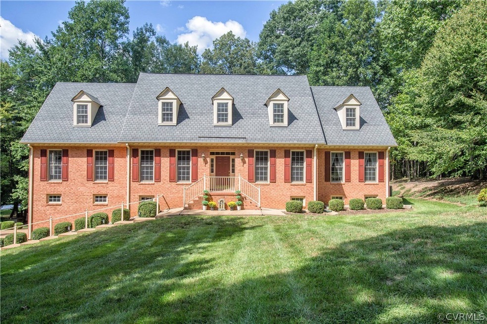 Fun begins here. Custom brick lakefront home with