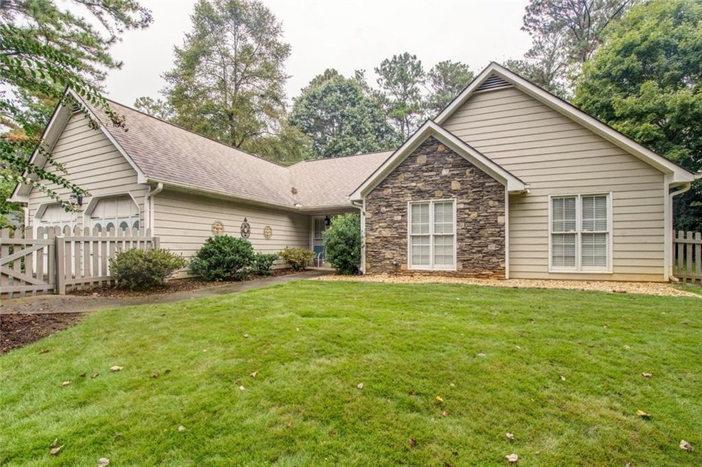 Spacious picket fenced front yard