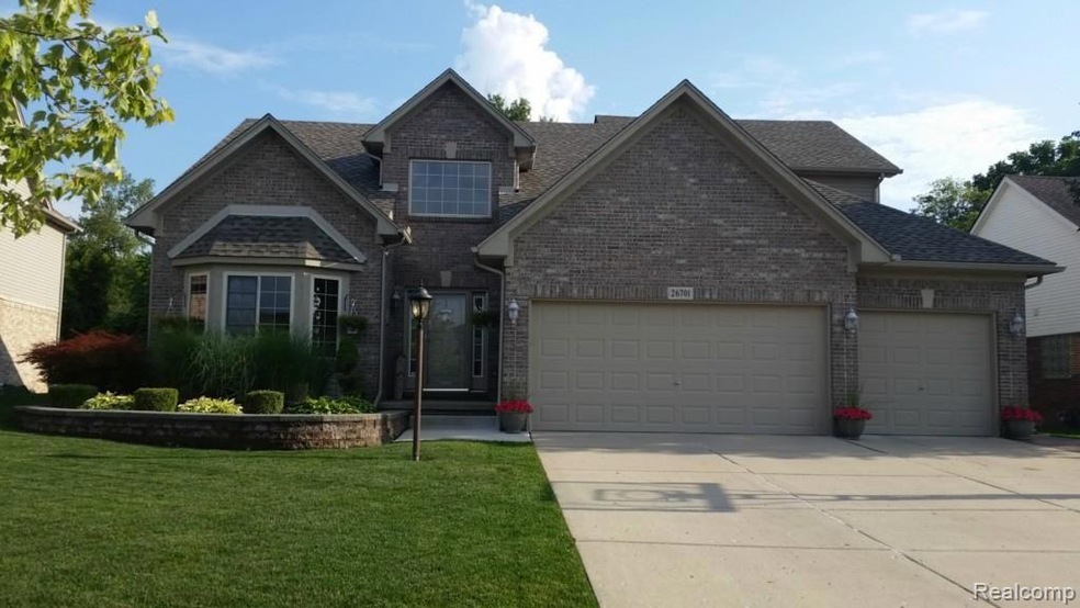 Front View of Home with 3 Car Garage