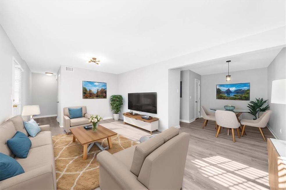 Light filled renovated living room and dining area space