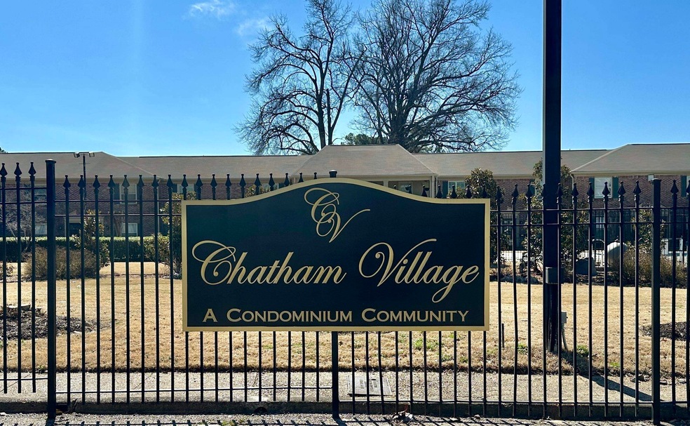 Community sign with fence