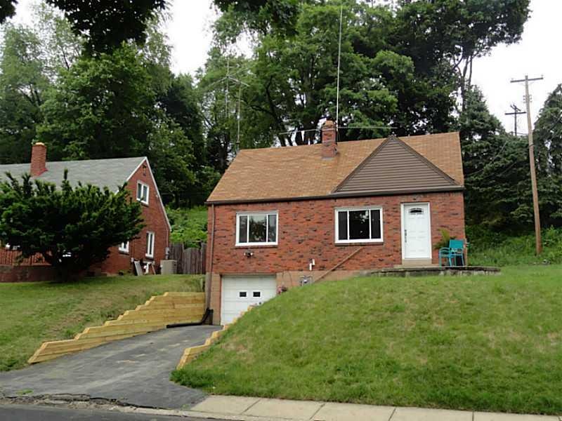 Exterior Front. Clinker brick, new front retaining