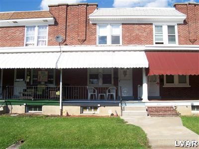 FRONT OF HOUSE WITH NICE COVERED PORCH