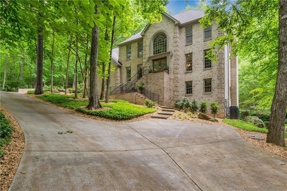 Gorgeous 4-sides brick beauty on 1.5 acres on quie