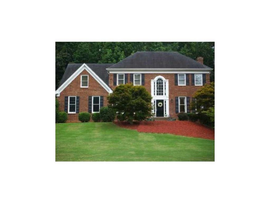 Exterior Front. Four side brick home on full finis
