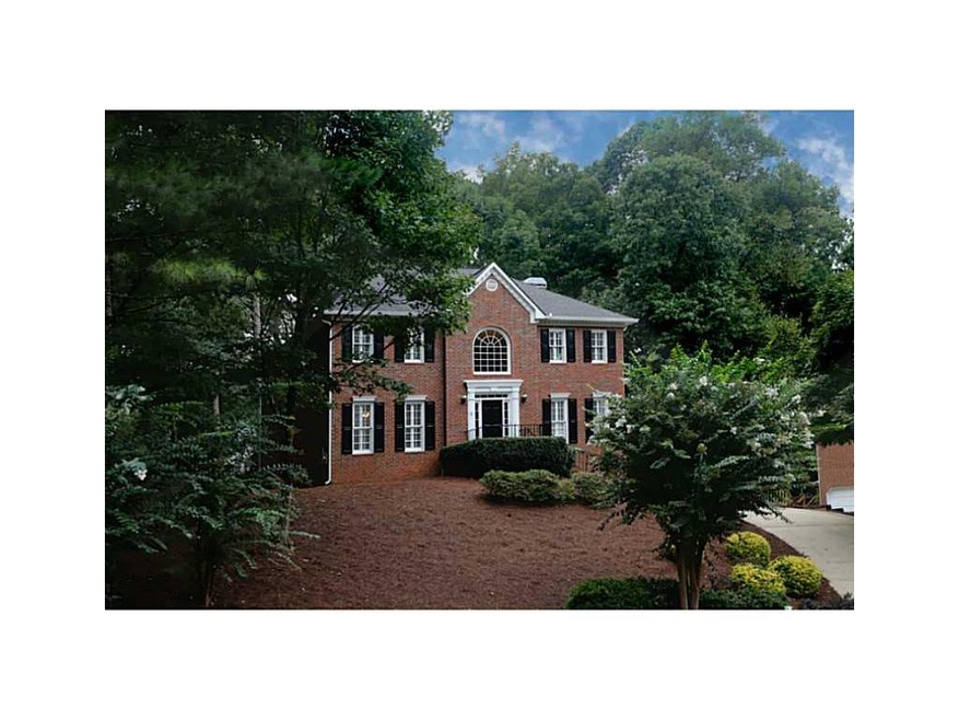 Exterior Front. Charming Three Side Brick Home in 