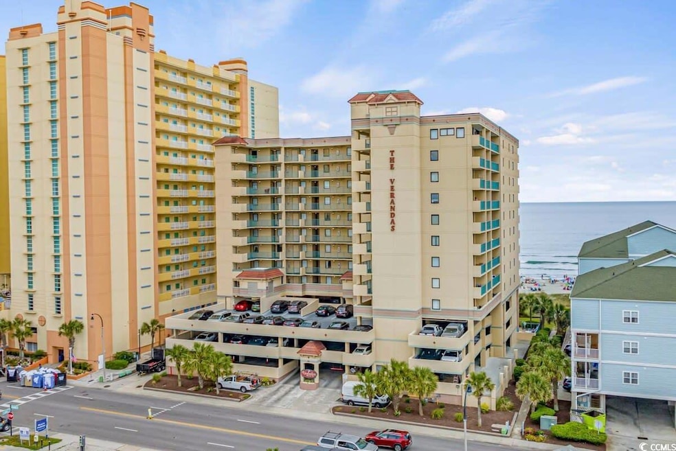 View of building exterior featuring a water view