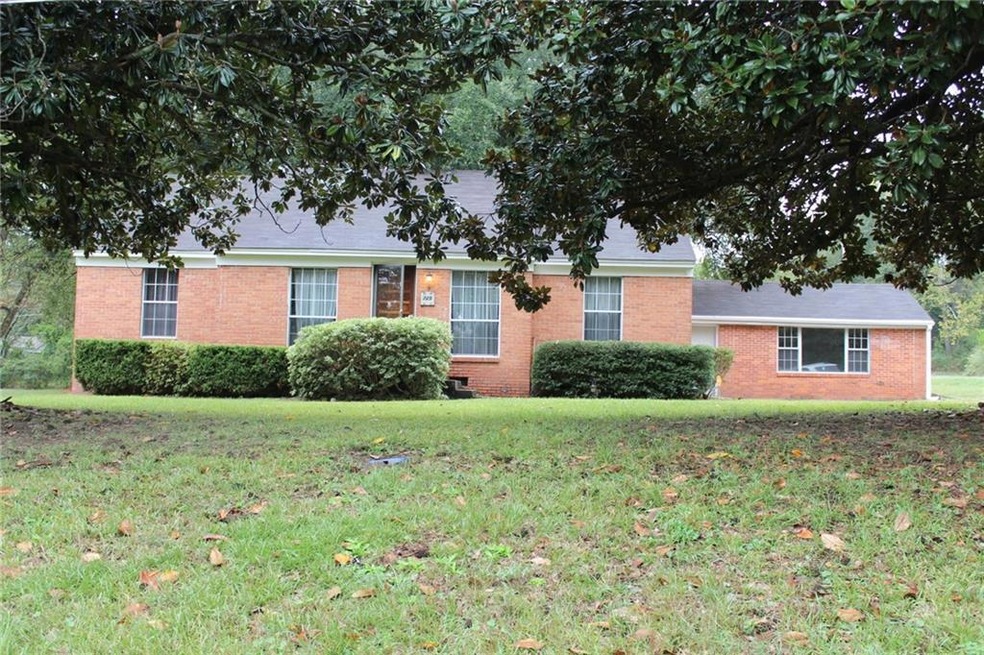 FRONT: This home sits on a large corner lot. 2 gor