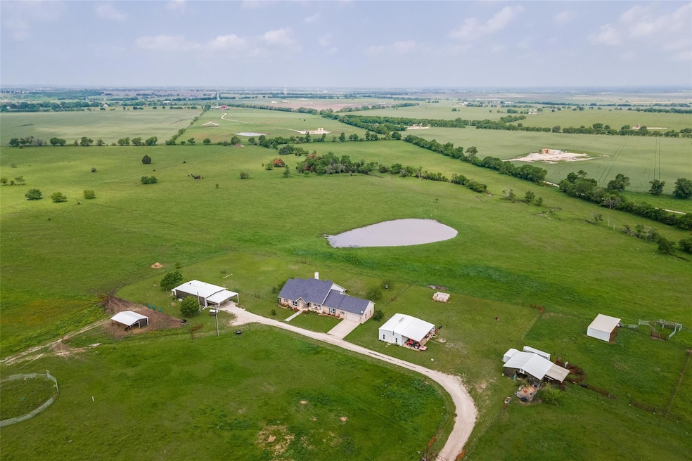 Beautiful home on 53.55 acres. Bring your toys and all the animals!