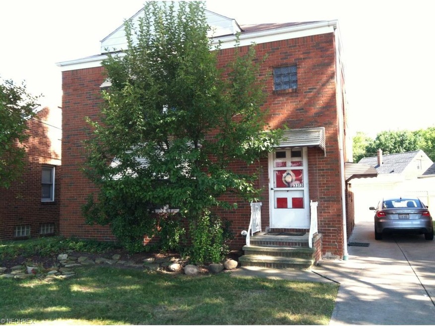 All brick double directly across from Warren Village shopping center.