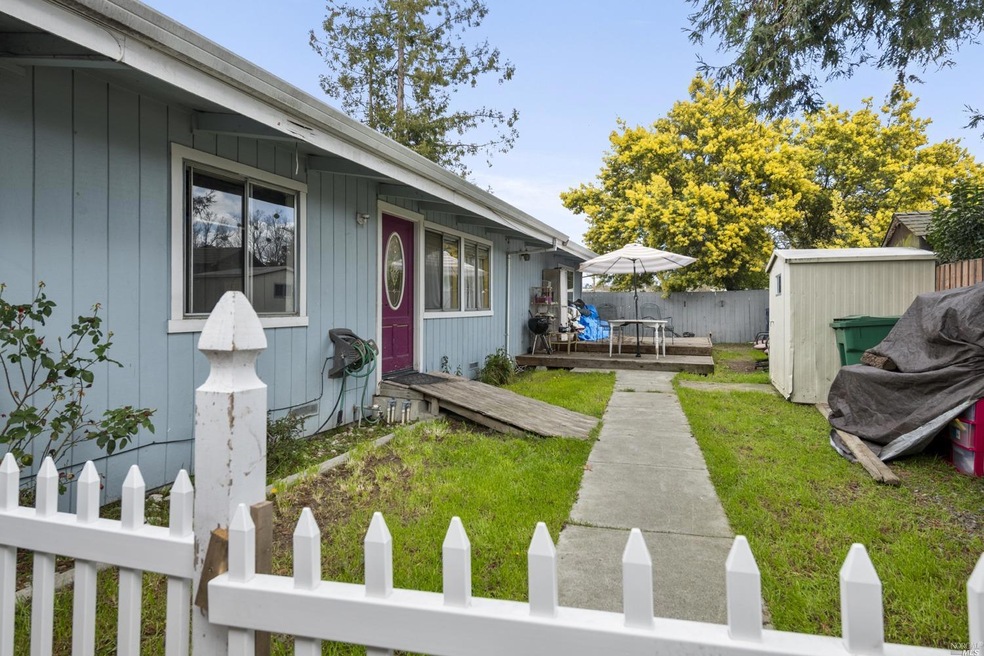 Inviting, private front yard with entry to main portion of home. Keep ramp in place or remove for a traditional entry.