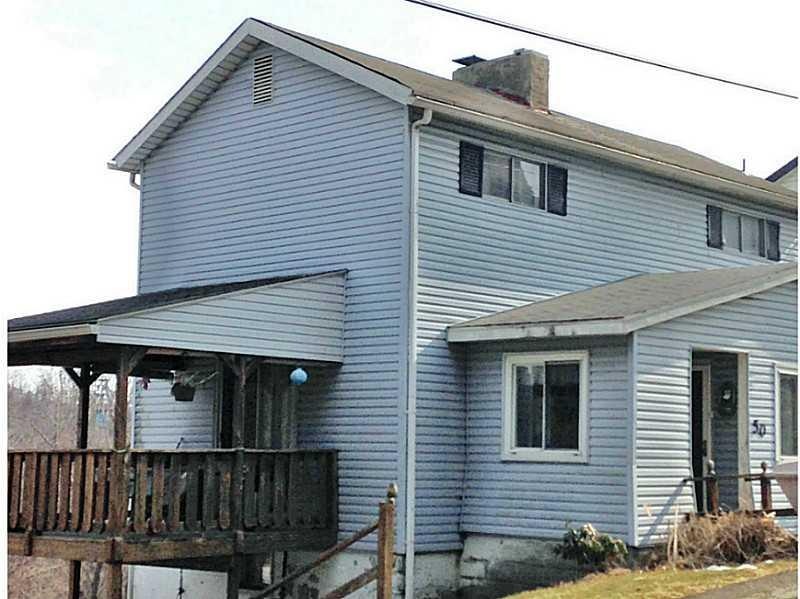 Exterior Front. Garage and On Street Parking