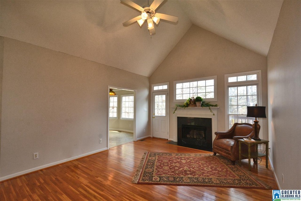 High vaulted ceilings, oak hardwood flooring and l