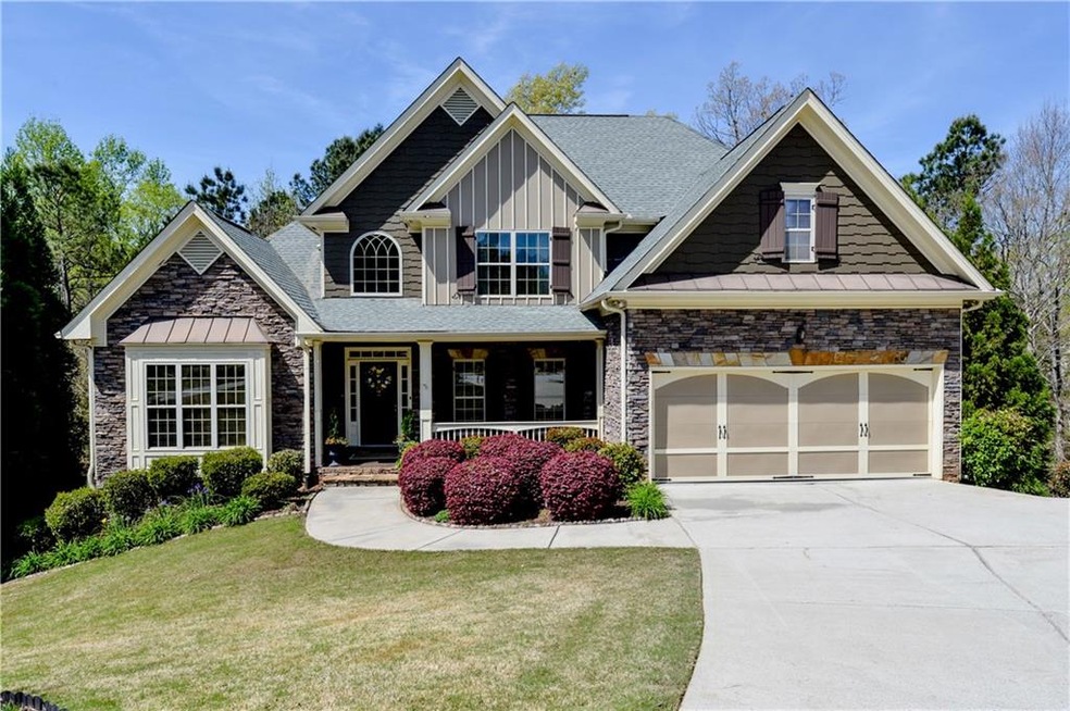 Beautiful stacked stone & shake front with real hi
