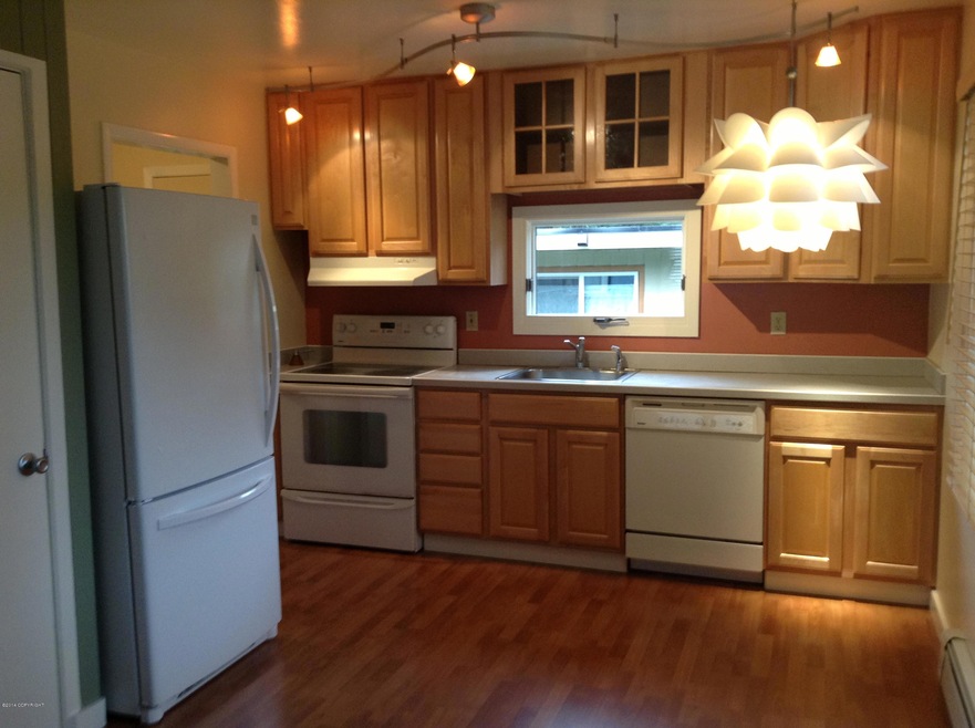 Kitchen open to living room for light!