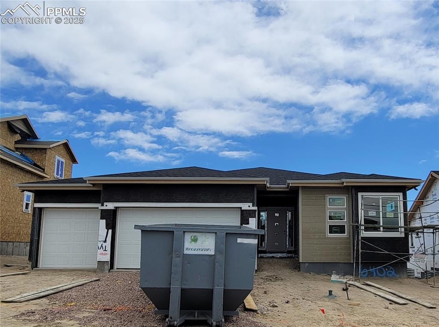 Somerton-Prairie Elevation-Ranch Plan-3 Car Garage-Finished Garden Level Basement with 9' Ceilings! Please, excuse our dust as this home is currently under construction.