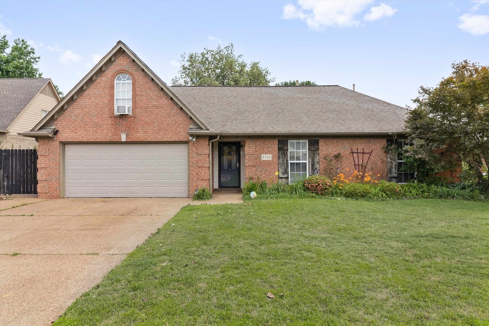 View of front facade with brick siding, concrete driveway, roof with shingles, and cooling unit