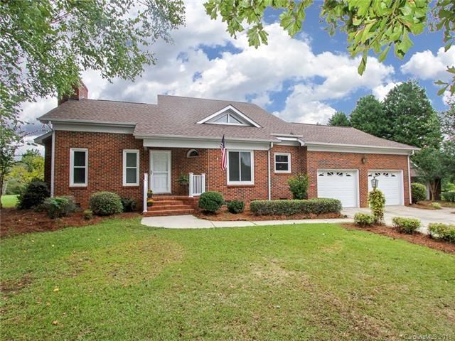 Welcome Home to the brick beauty on 1 acre!