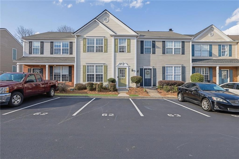 View of front of home with uncovered parking