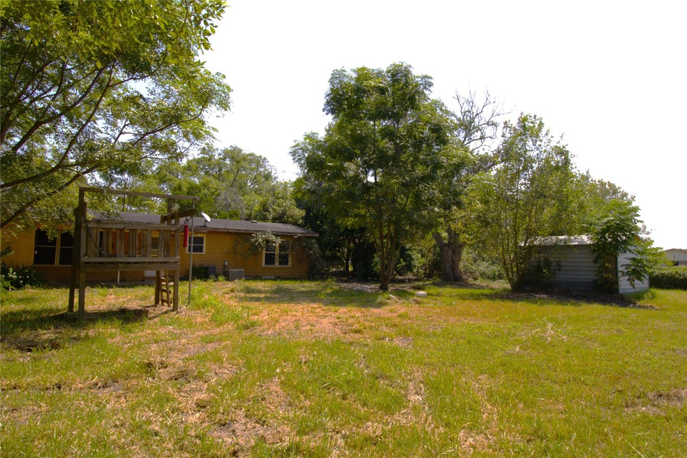 Welcome home!  This house sits on 2.5 lots for 1/2