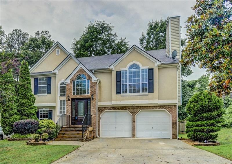 Lovely and well maintained raised ranch with profe
