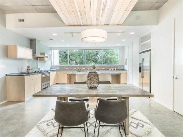 Open modern kitchen with combined dining. Lots of 