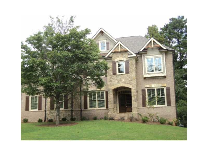 Exterior Front. Beautiful brick European style hom