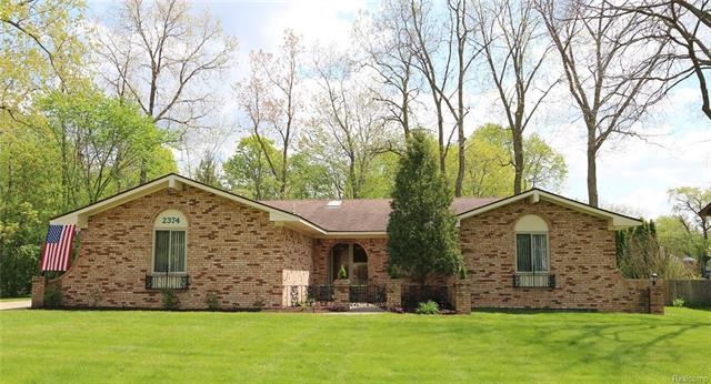 Beautiful Spanish revival style ranch with covered