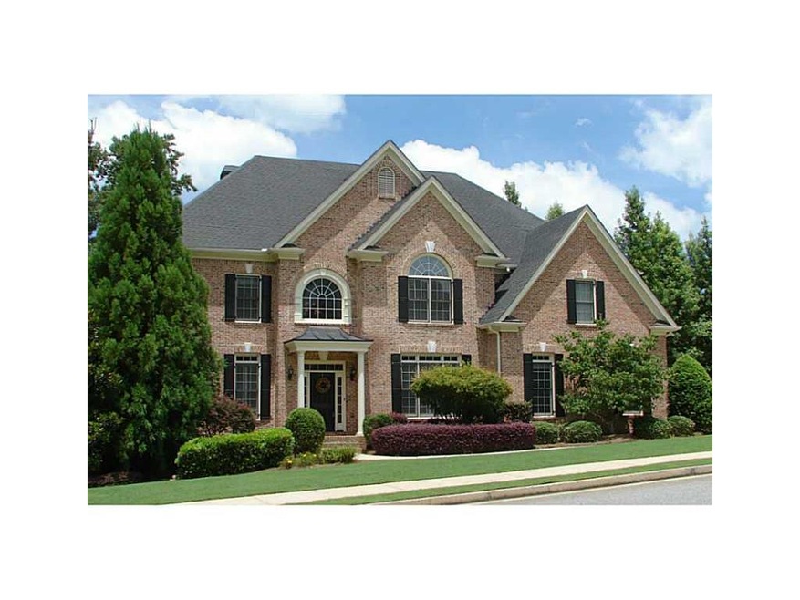 Exterior Front. Stately 4-sides brick home of majo