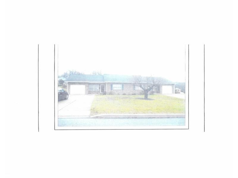 Exterior Front. Side by Side Duplex