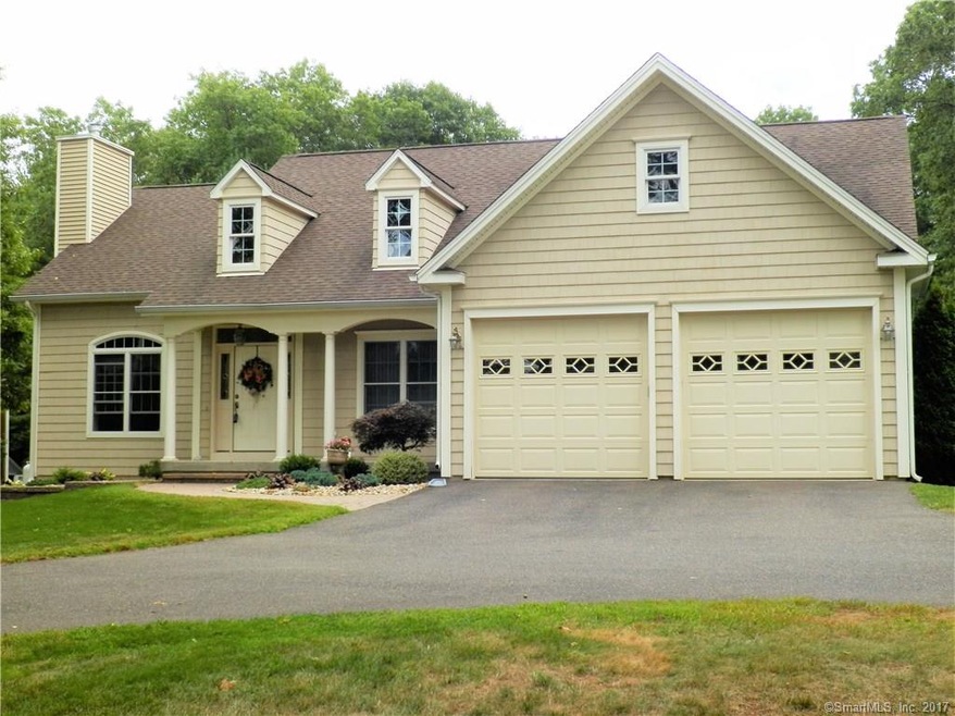 exterior front with columned porch and over sized 