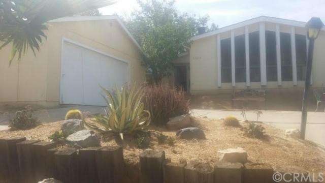 Front of Home with Drive through driveway