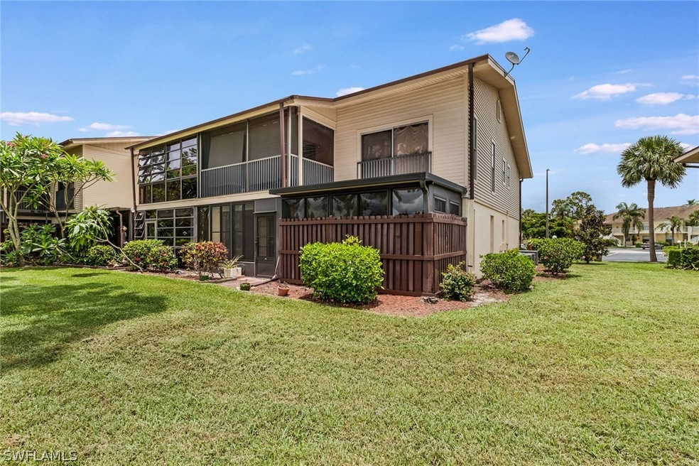 Ground floor end unit 2/2 condo with lake view!