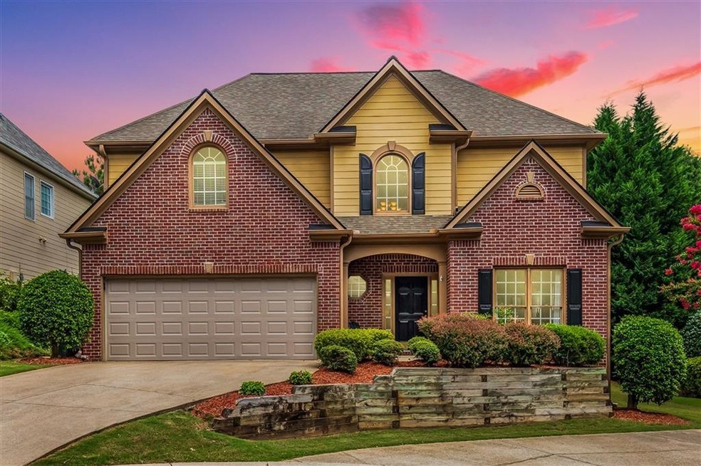 Great curb appeal with a brick front and covered f