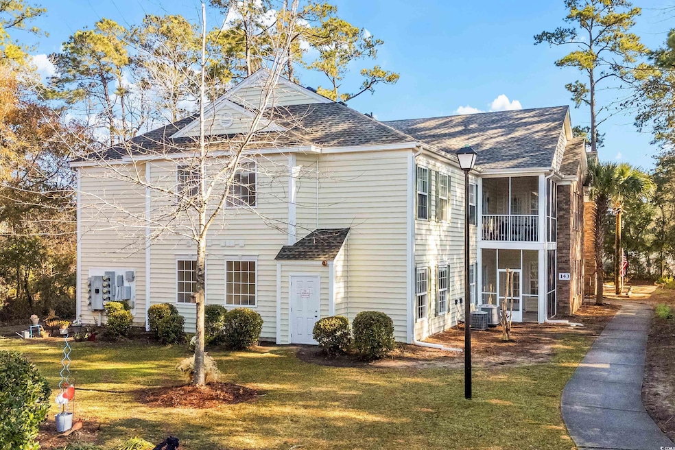 View of side of home featuring a sunroom, central 