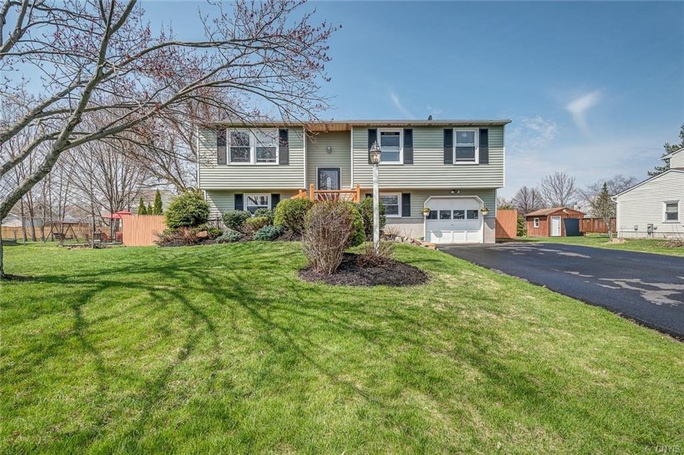 Welcome Home! Lovely updated raised ranch with bea